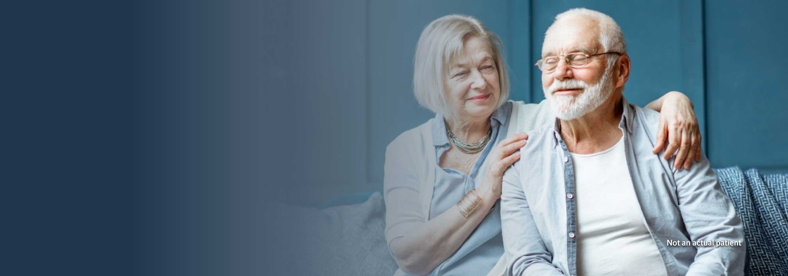 couple embracing on a couch